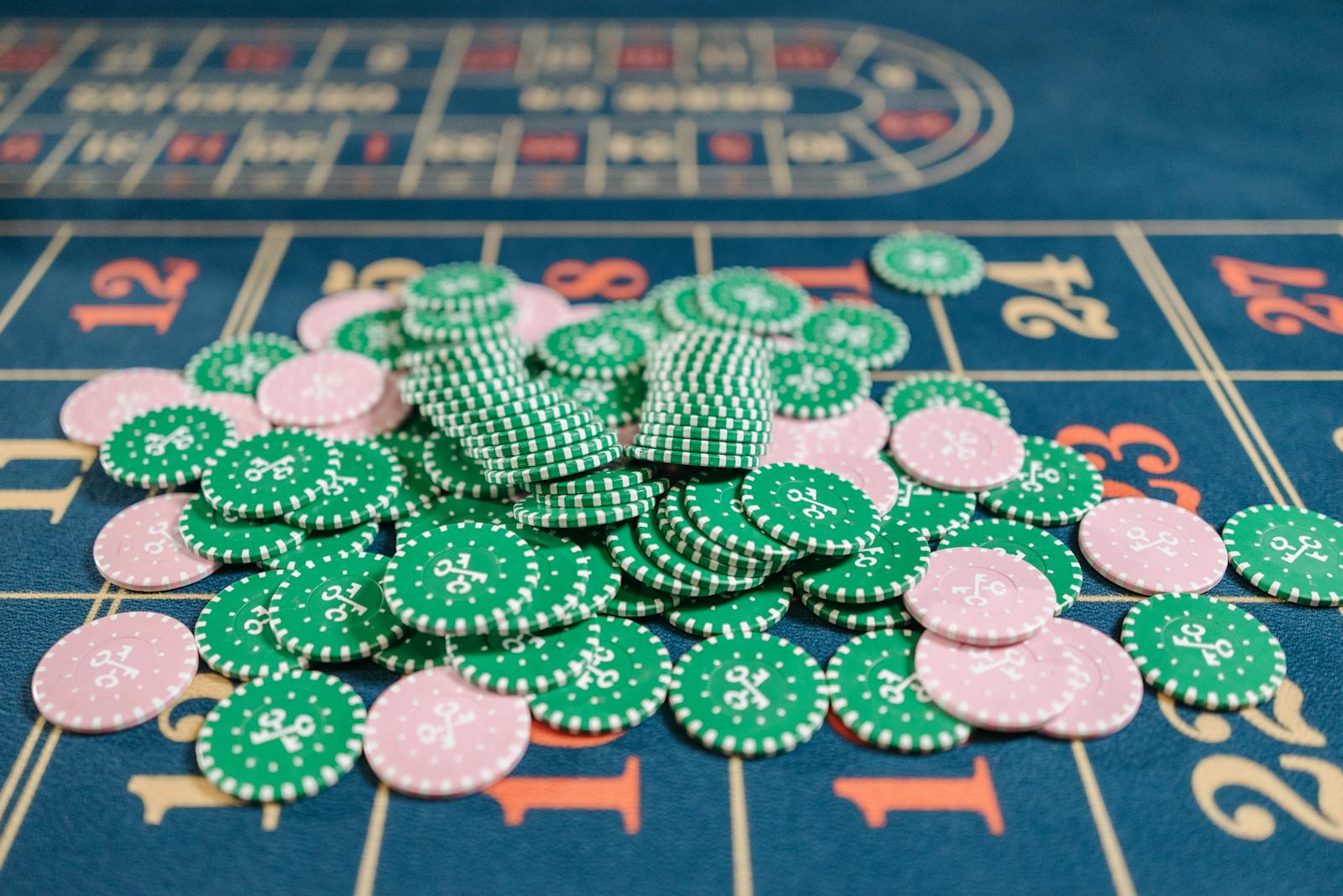 Poker chips and cards on a felt table
